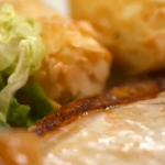 Grilled pork chop with potato croquettes and salad by James Martin
