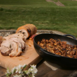 Brian Turner roast porchetta with bread pudding and cider brandy-glazed apples on A Taste Of Britain