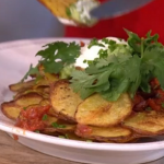 Phil’s 4 ways with the humble spud potato nachos with tomato salsa and sour cream recipe on This Morning
