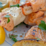 Ainsley Harriott seafood skewers with a peperonata  salad recipe on Ainsley’s Mediterranean Cookbook