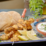 Ainsley Harriott harissa and lemon chicken skewers with a garlic and mint dipping sauce on Ainsley’s Mediterranean Cookbook