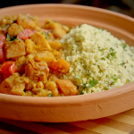 Ainsley Harriott butternut squash, spinach and sweet potato tagine with lemon and pistachio couscous recipe on Ainsley’s Mediterranean Cookbook