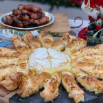 Clodagh Mckenna Christmas party feast with baked Camembert star and pigs in blankets on This Morning