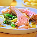 Michel Roux roast rack of lamb with garlic and seasonal green vegetables on  Michel Roux’s French Country Cooking