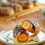 Nadiya Hussain banana and peanut butter roll-ups with dark chocolate and tortilla wraps recipe on Nadiya’s Everyday Baking
