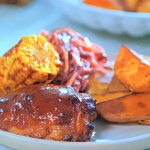 Jamie Oliver BBQ chicken thighs with corn, potato wedges and slaw recipe on Jamie’s £1 Wonders