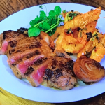 James Martin surf and turf with braised Sirloin steak, chilli prawns and caramelised onion recipe