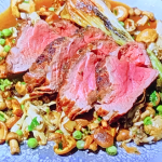 James Martin beef fillet with wild mushrooms, peas and spring onions recipe on James Martin’s Spanish Adventure