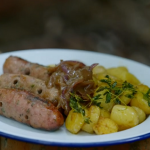 Marcus Wareing bangers and fried potatoes with wild boar sausages and onion gravy recipe on Marcus Wareing’s Tales of a Kitchen Garden