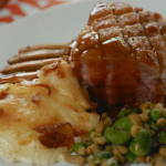Rick Stein rack of lamb with dauphinoise potatoes, beans, peas and gravy recipe on Rick Stein’s Food Stories