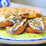 Marcus Wareing peppered sardines on toast with green olive sauce on toasted almonds recipe