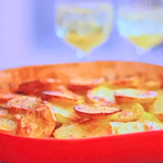 John Torode and Lisa Faulkner braised shoulder of lamb with carrots, shallots and potato topping recipe on John and Lisa’s Weekend Kitchen