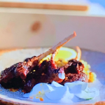 Judi Love spicy lamb chops with saffron rice and a yoghurt, mint and cucumber dressing recipe on Judi Love’s Culinary Cruise