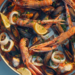 Mary Berry langoustine paella with cod, squid and mussels recipe on Mary’s Foolproof Dinners with Sarah Davies