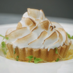 Monica Galetti lemon meringue tart with lemon curd, Italian meringue and lemon zest garnish on Masterchef The Professionals