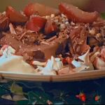 Jamie Oliver mulled wine pear pavlova with chocolate sauce and toasted nuts recipe on Jamie Cooks Christmas