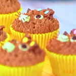 Rav Gill cat cupcakes with orange chocolate on Junior Bake Off