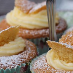 Orange butterfly cakes and bite-sized scones for a cream tea recipe by Mary Berry