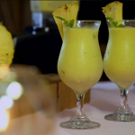 Ainsley Harriott coconut with pineapple, mango and mint cocktail recipe on Ainsley’s Caribbean Kitchen