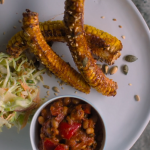 Prue Leith and Dr Rupy Aujla homemade baked beans with BBQ corn ribs and slaw recipe on  Cook Clever, Waste Less with Prue and Rupy