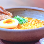 Rex’s arroz caldo risotto with crispy chicken skin and a boiled egg on The Great Cook Book Challenge