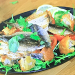 Ainsley Harriott pan-seared sardines with thyme-roasted vine tomato and bread salad recipe on Ainsley’s Good Mood Food