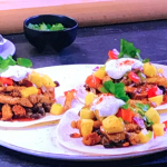 Ainsley Harriott sticky pork and smoky bean tacos with pineapple salsa recipe on Ainsley’s World Cup flavours